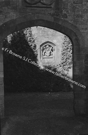 LISMORE CASTLE  CREST THROUGH ARCHWAY NEAR GARDEN